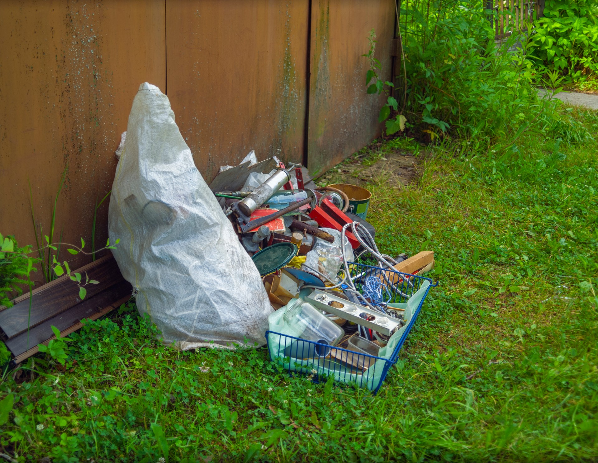 garbage left outside of a garage